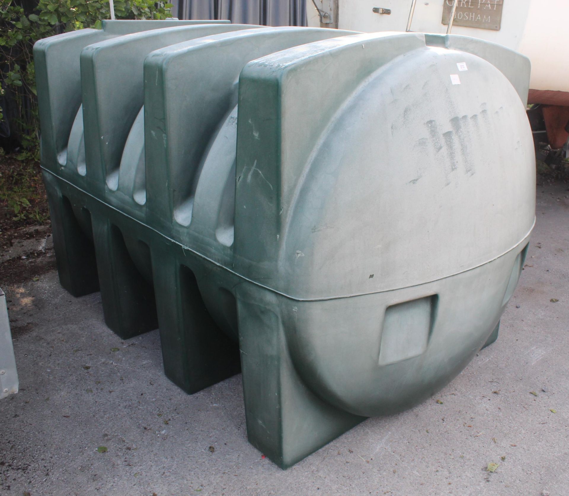 A 2400L GREEN PLASTIC FUEL TANK (VENDOR STATES IT DOES NOT LEAK BUT NO WARRANTY) PLUS VAT