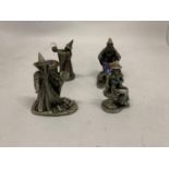 FOUR PEWTER STYLE WIZARDS WITH CRYSTALS