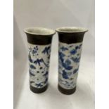 A PAIR OF LATE 19TH CENTURY CHINESE CRACKLE GLAZE BLUE AND WHITE CYLINDRICAL SLEEVE VASES, SEAL MARK