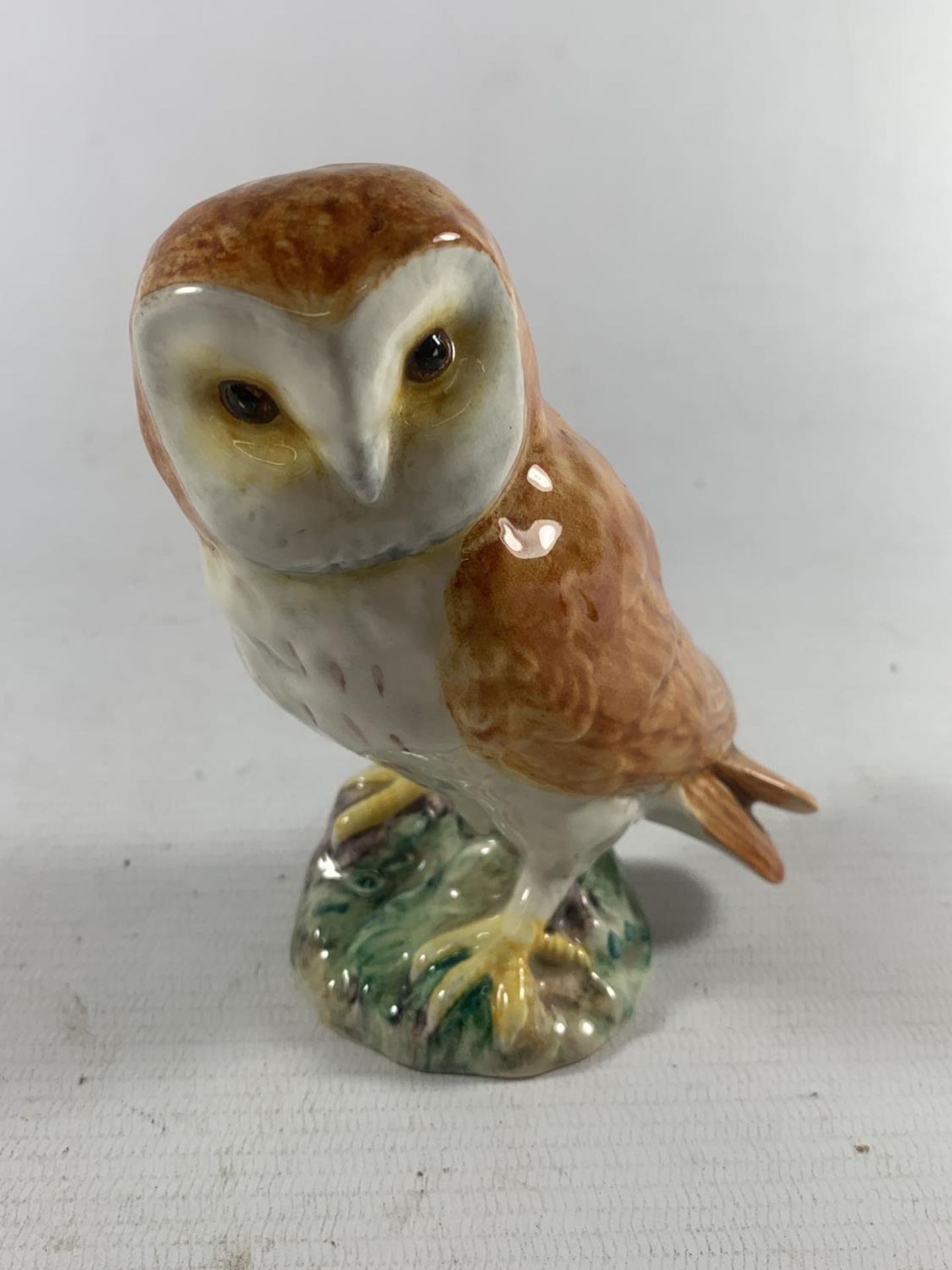 A BESWICK FIGURE OF A BARN OWL