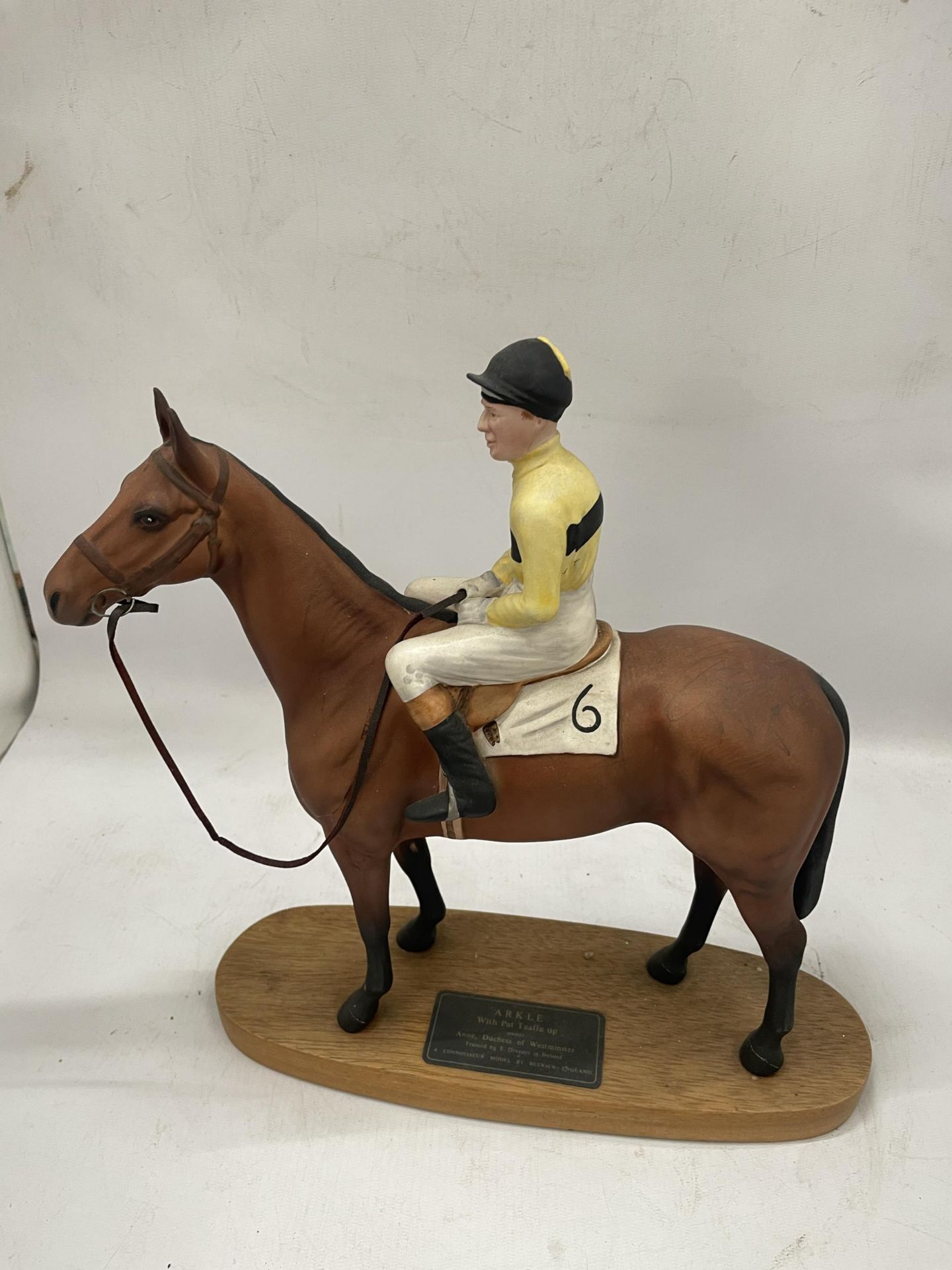 A BESWICK CONNOISSEUR HORSE AND JOCKEY FIGURE - ARKLE WITH PAT TAAFFE UP ON WOODEN BASE