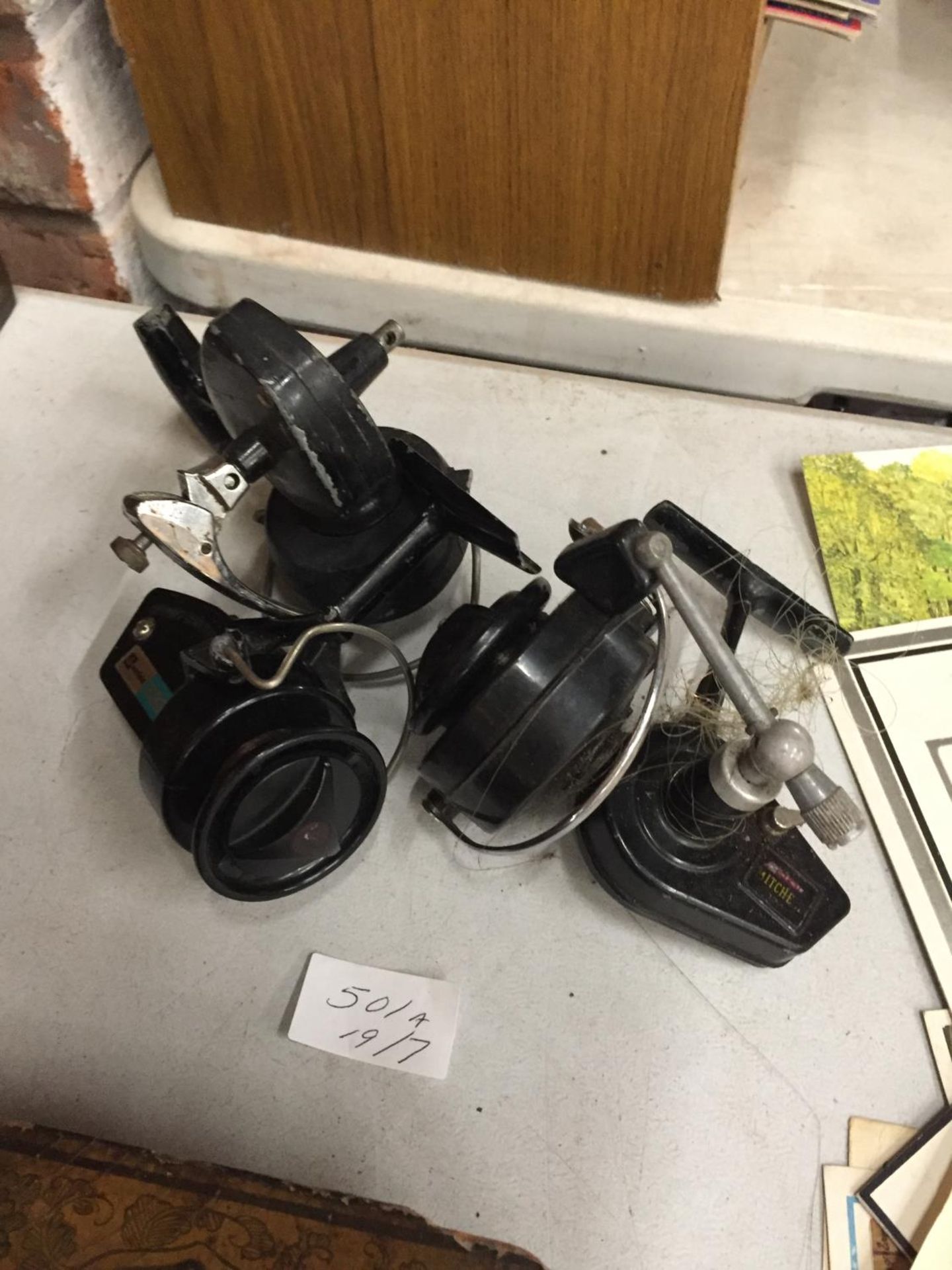 THREE FISHING REELS TO INCLUDE WINFIELD 333, GARATE MITCHE ETC.,