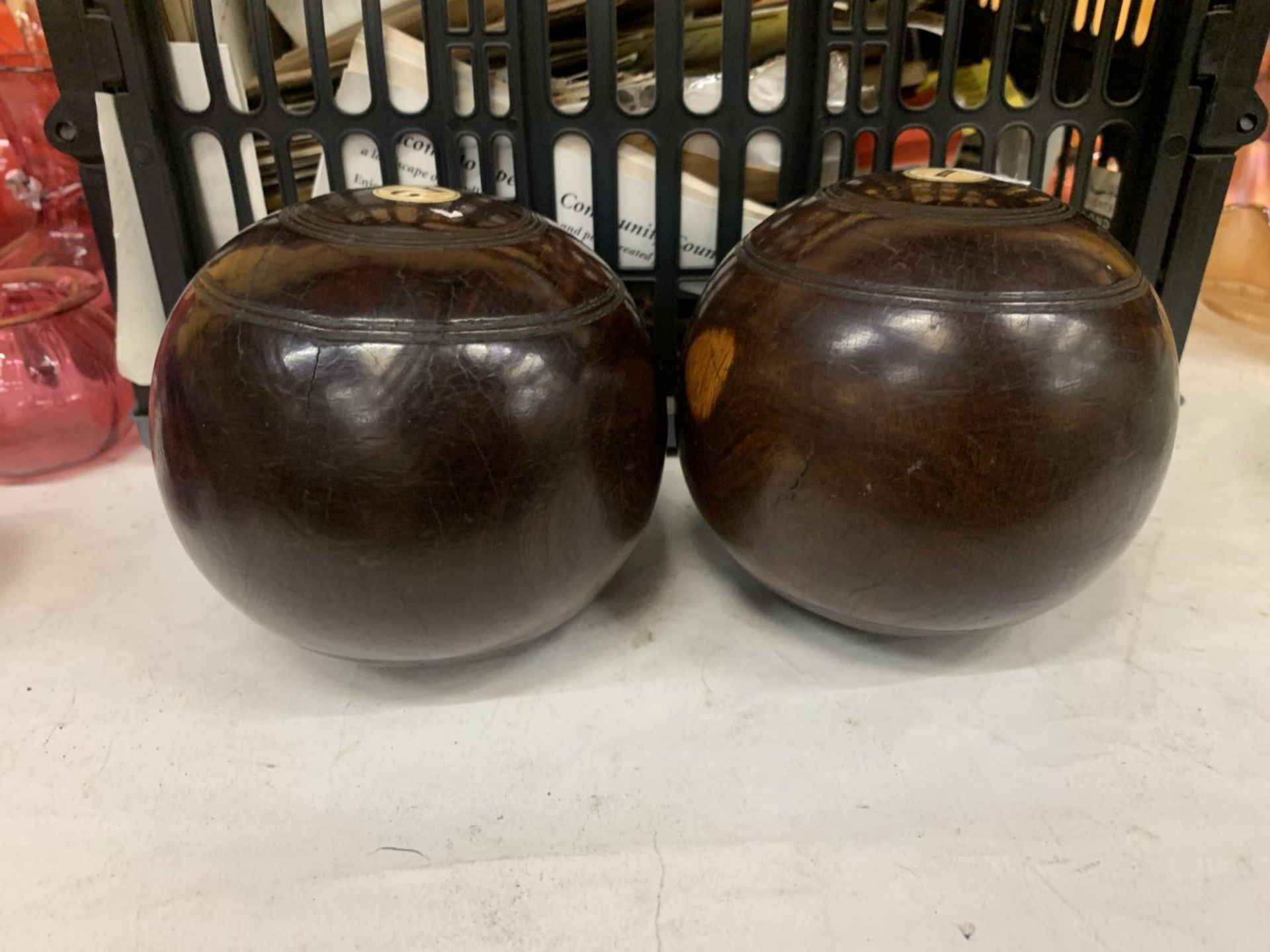 A PAIR OF VINTAGE BOWLS DATED 1894 AND 1904