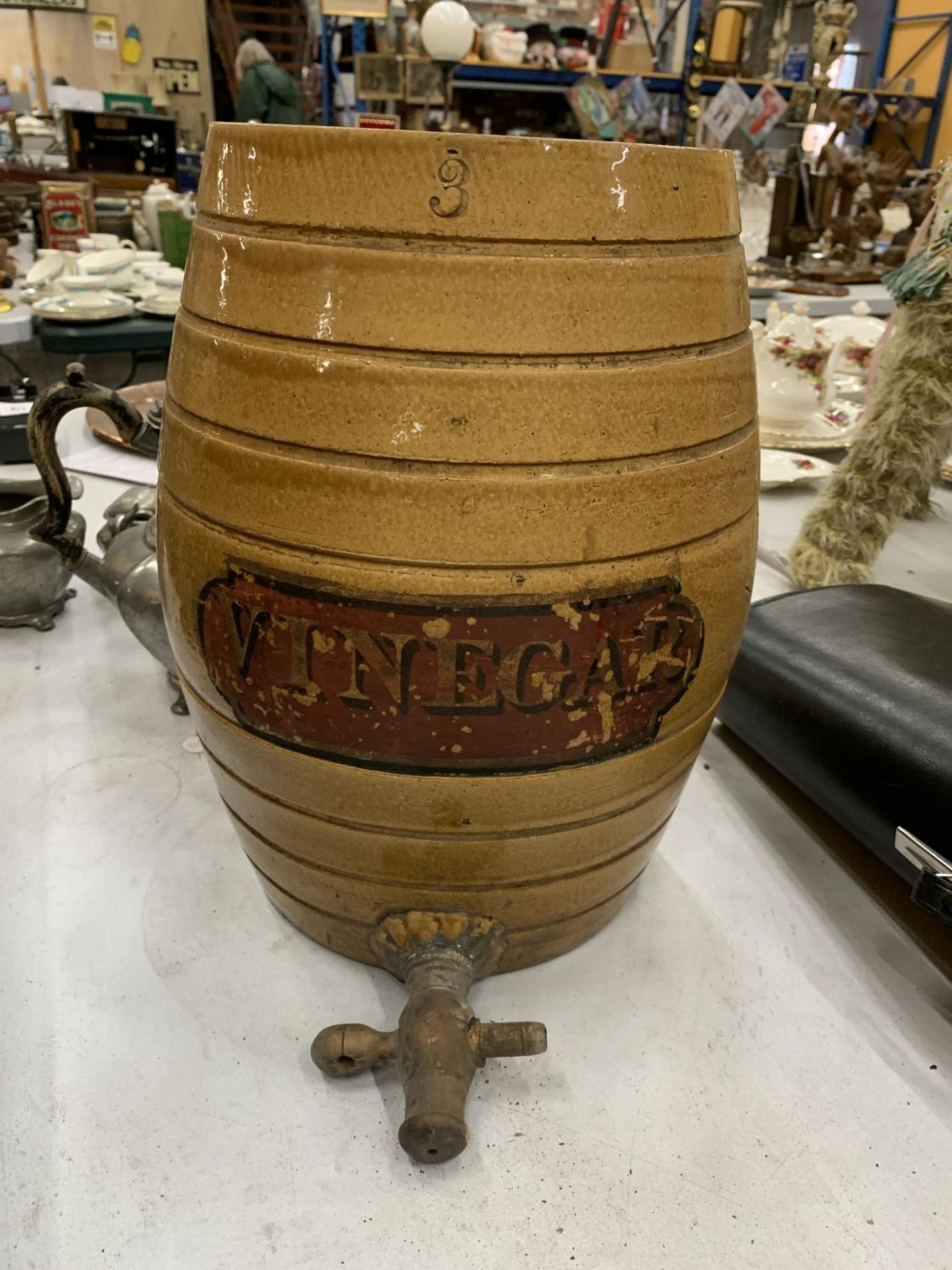 A LARGE STONEWARE 'VINEGAR' BARRELL WITH TAP TO THE BASE, BY PRICE AND SONS