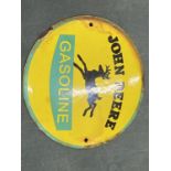 A SMALL JOHN DEERE ENAMEL SIGN, DIAMETER 15CM