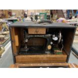 A VINTAGE TABLE TOP SINGER SEWING MACHINE NO. Y8919096 WITH ACCESSORIES