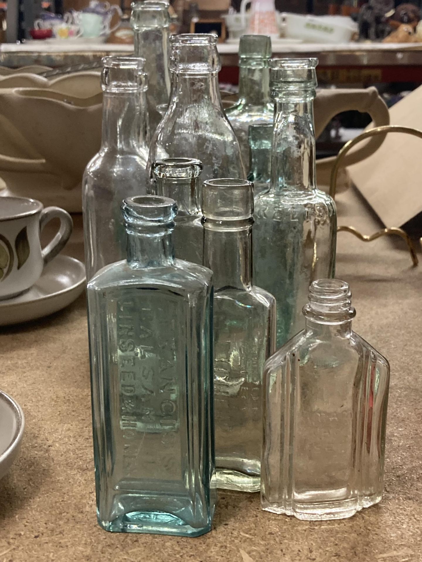 A COLLECTION OF VINTAGE GLASS BOTTLES