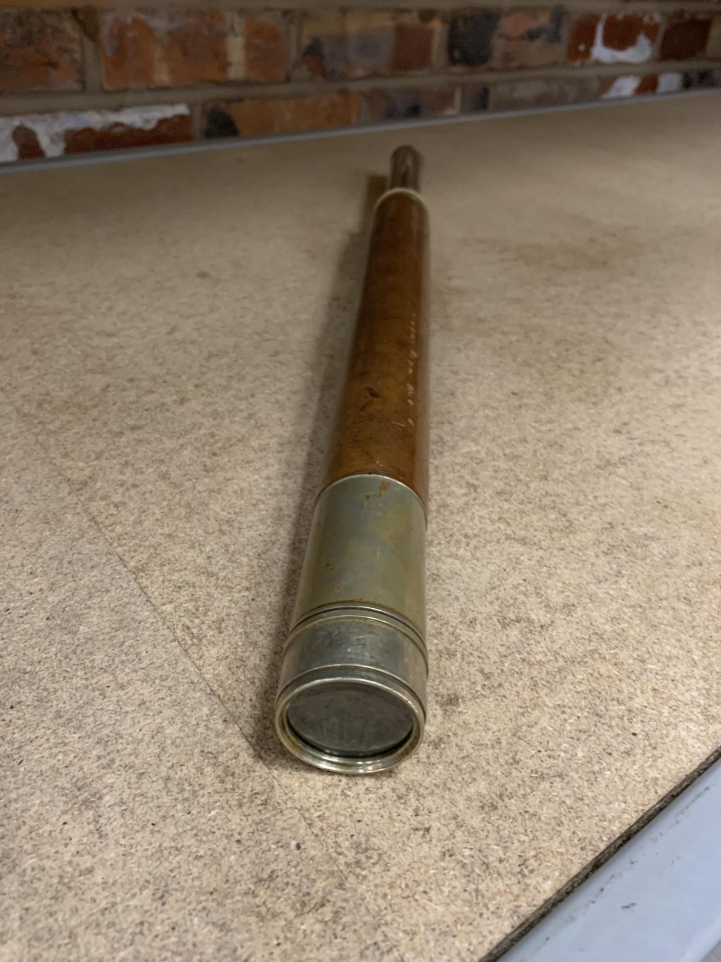 A VINTAGE BRASS TELESCOPE WITH LEATHER CASING MADE BY G LEE AND SON, 33 THE HARD, PORTSMOUTH