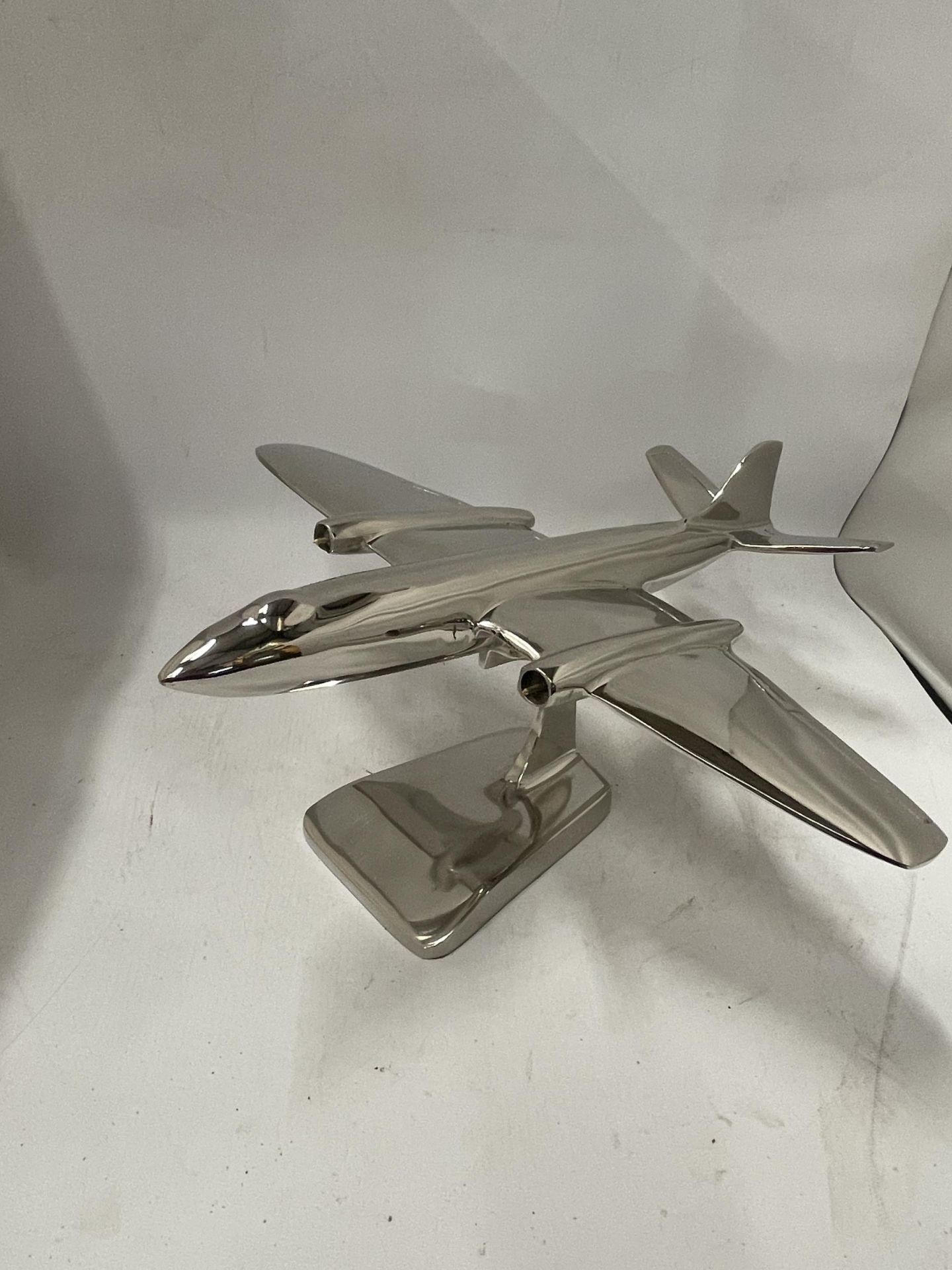 A CHROME JET AEROPLANE MODEL