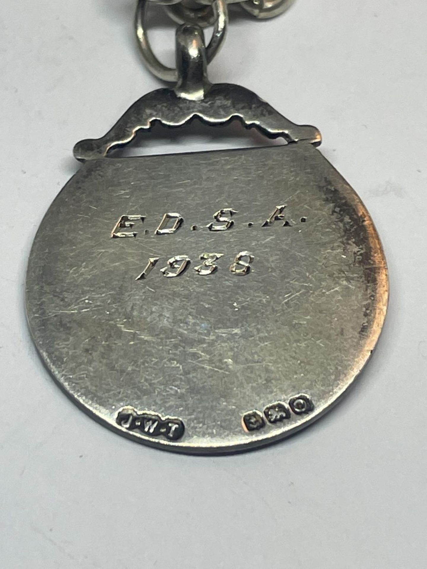 A SILVER HALF ALBERT CHAIN WITH A HALLMARKED BIRMINGHAM FOB - Image 2 of 3