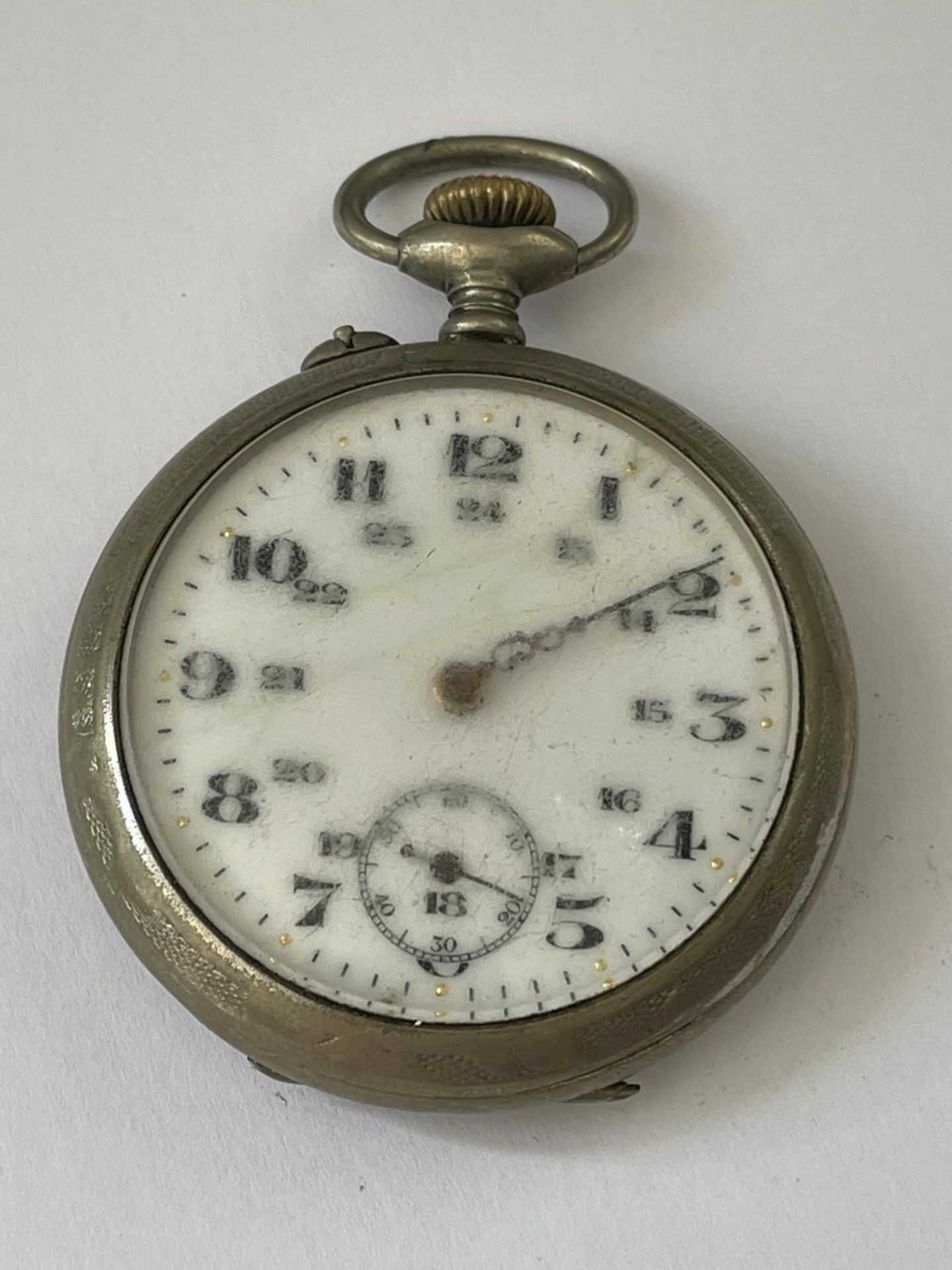 A VINTAGE WHITE METAL OPEN FACED POCKET WATCH, CASEBACK STAMPED ARGENTAN