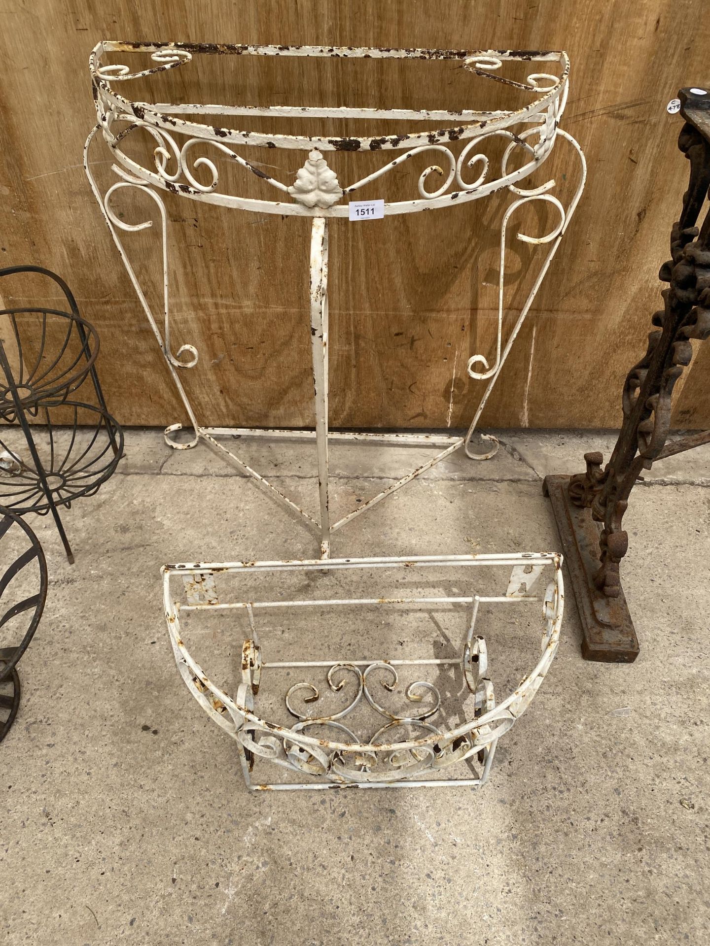 A WROUGHT IRON HALF MOON TABLE BASE AND A WINDOW BOX PLANT HOLDER