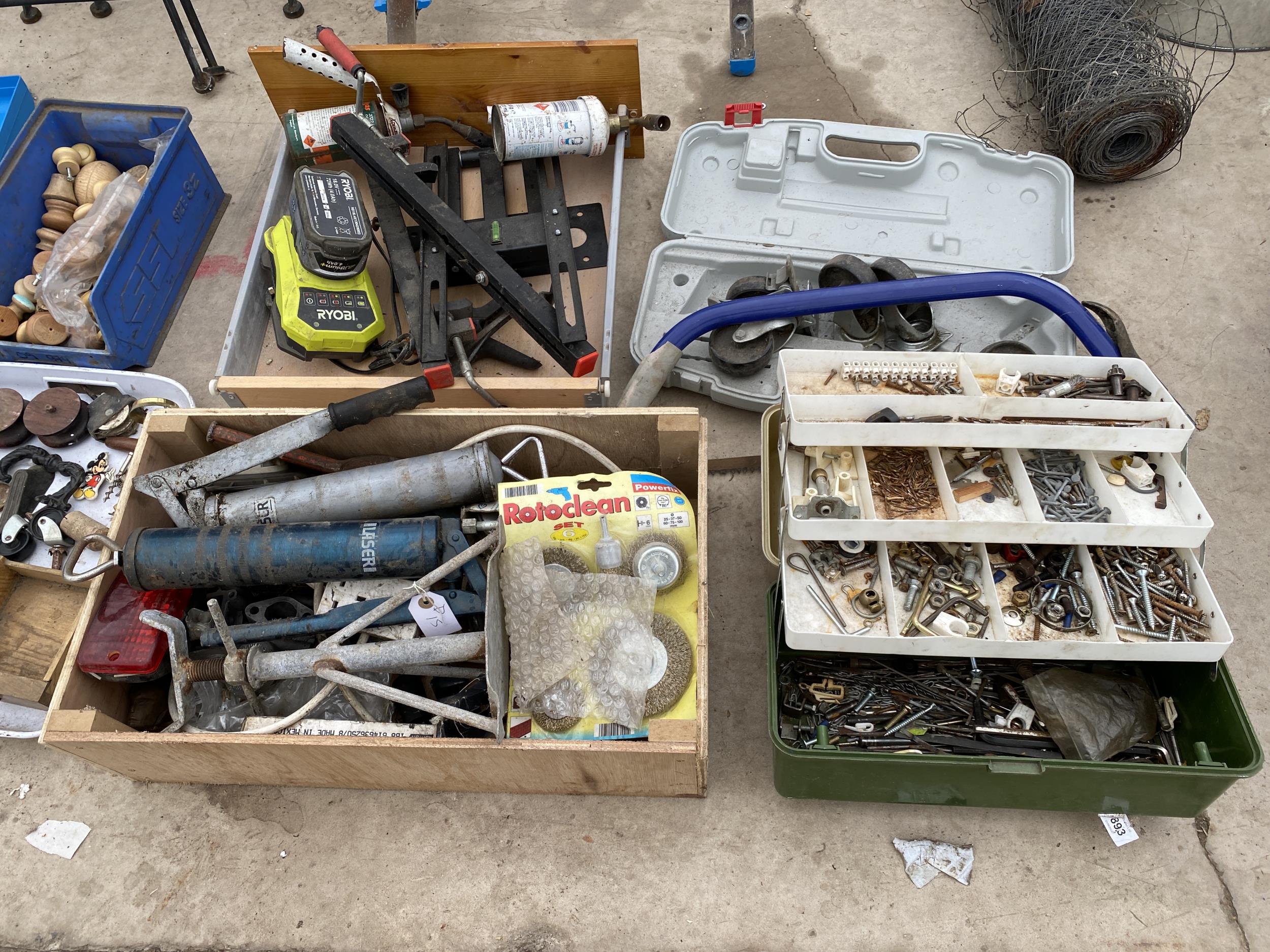 AN ASSORTMENT OF TOOLS TO INCLUDE GREASE GUNS, WHEELS AND A RYOBI BATTERY AND CHARGER ETC