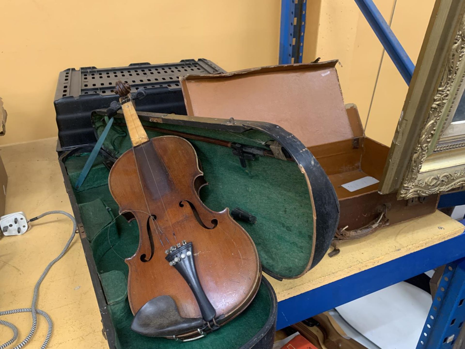 A VINTAGE VIOLIN IN CASE IN NEED OF RESTORATION PLUS A SMALL SUITCASE