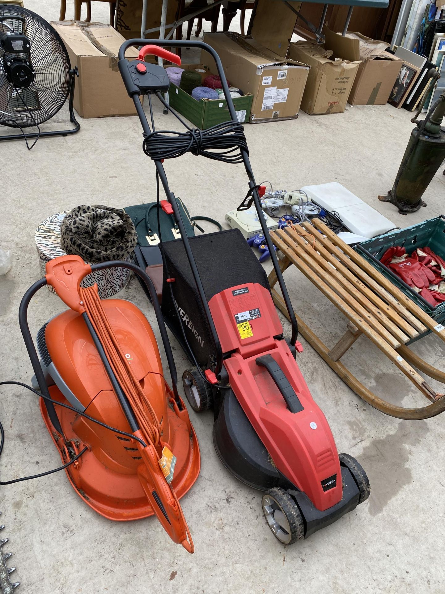 A SOVEREIGN ELECTRIC LAWN MOWER AND AN ELECTRIC FLYMO LAWN MOWER