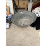 A VINTAGE GALVANISED TIN BATH