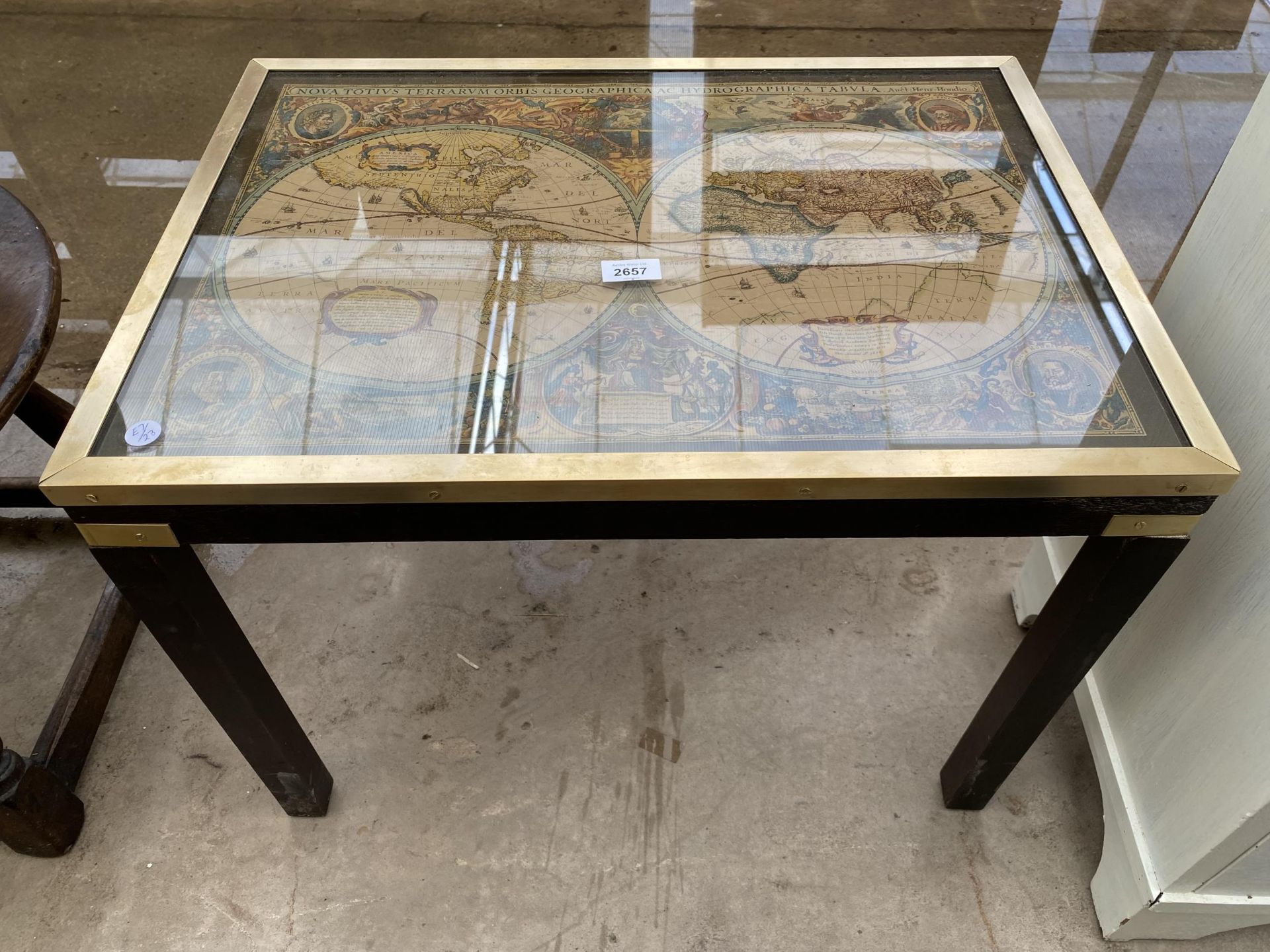 A MODERN COFFEE TABLE, THE TOP INSET WITH VINTAGE STYLE WORLD MAP, 25X18"