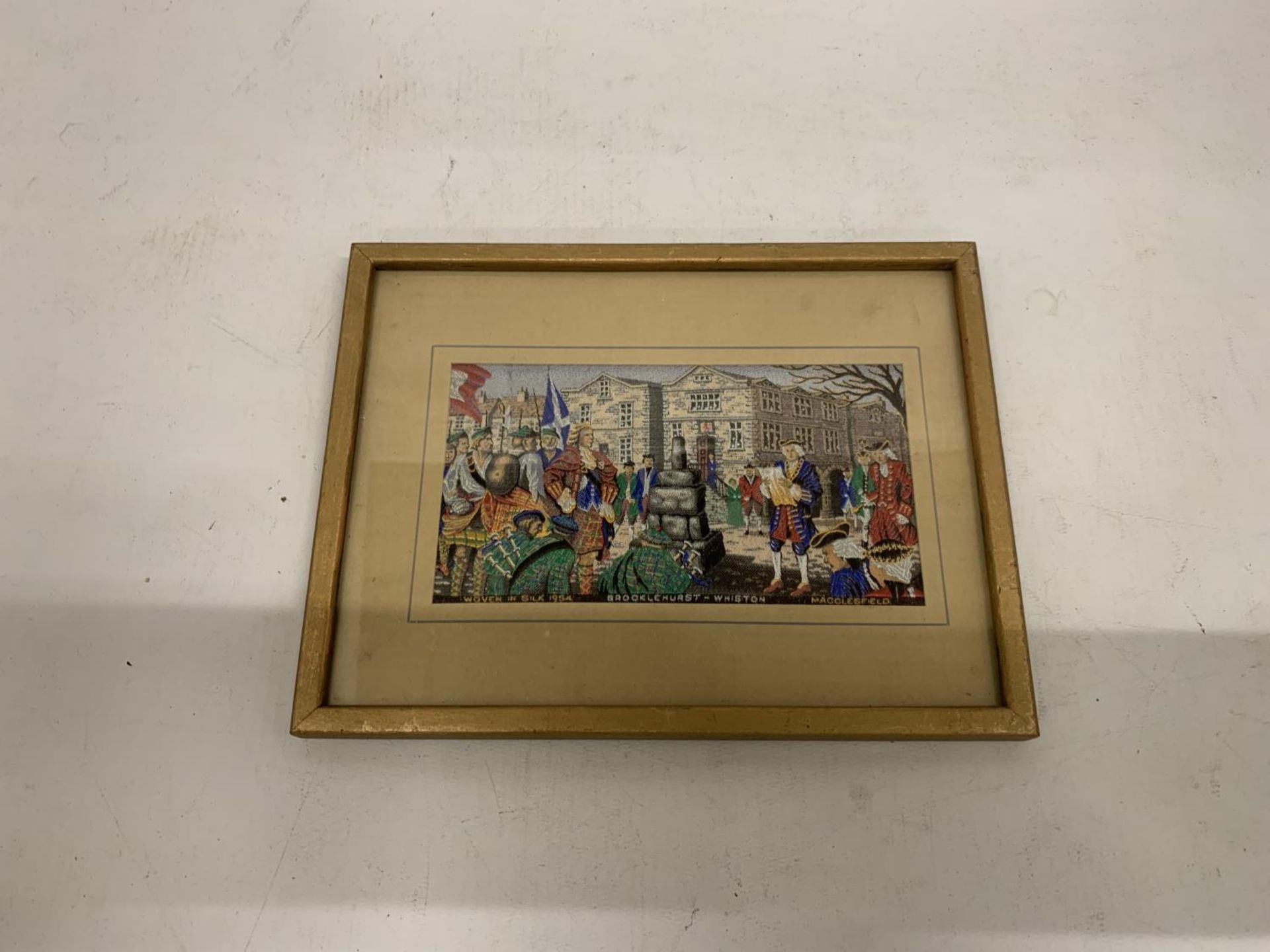 A FRAMED MACCLESFIELD SILK OF THE BROCKLEHURST RIOTS