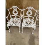 A PAIR OF WHITE CAST ALLOY BISTRO CARVER CHAIRS