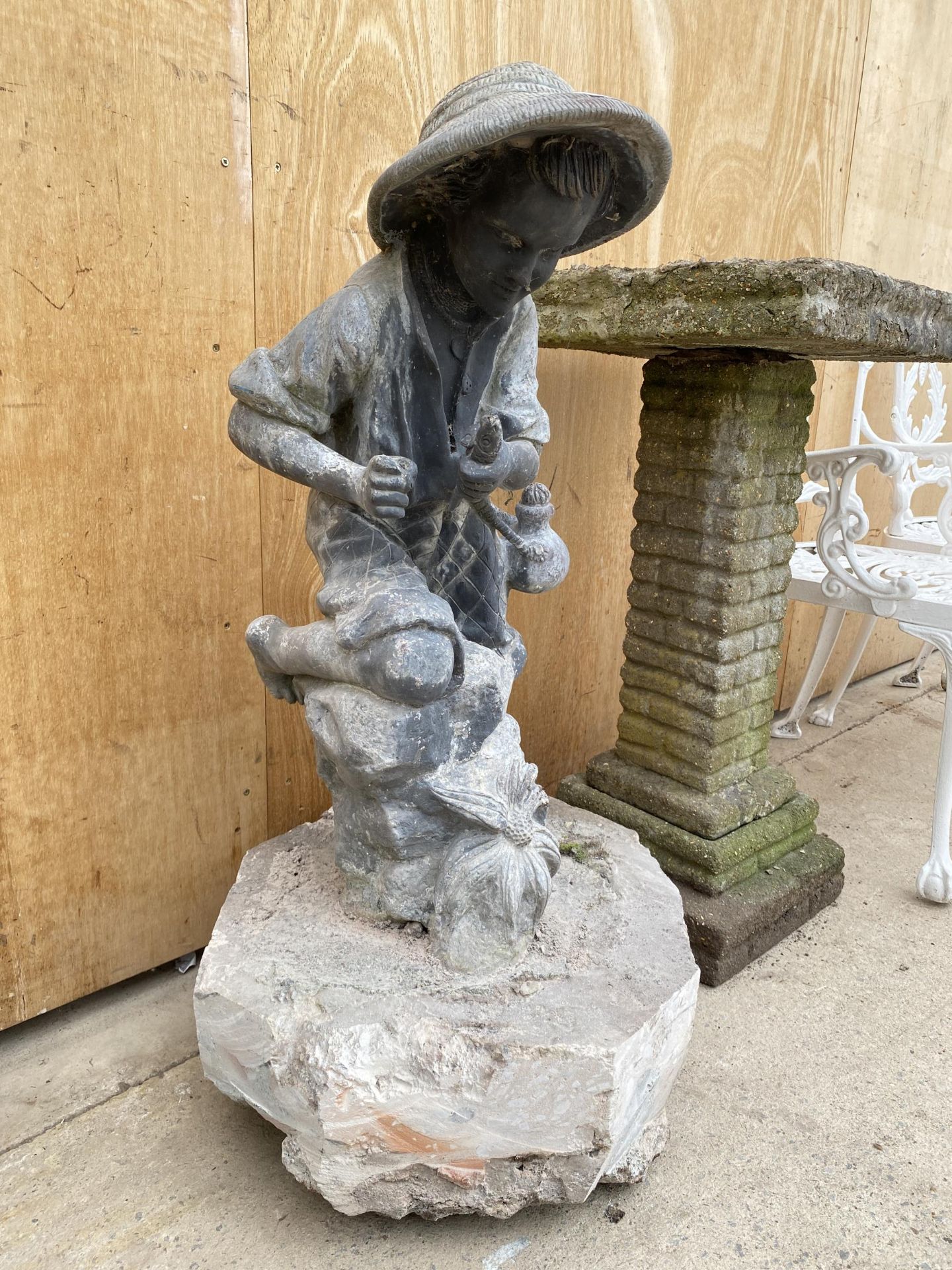 A 19TH CENTURY HEAVY LEAD STATUE OF A BOY FISHING ON A CONCERETE BASE (H:90CM)