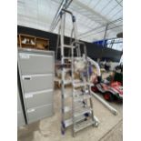 A LARGE 6 RUNG ALUMINIUM ABRU STEP LADDER AND A FURTHER 4 RUNG ALUMINIUM STEP LADDER