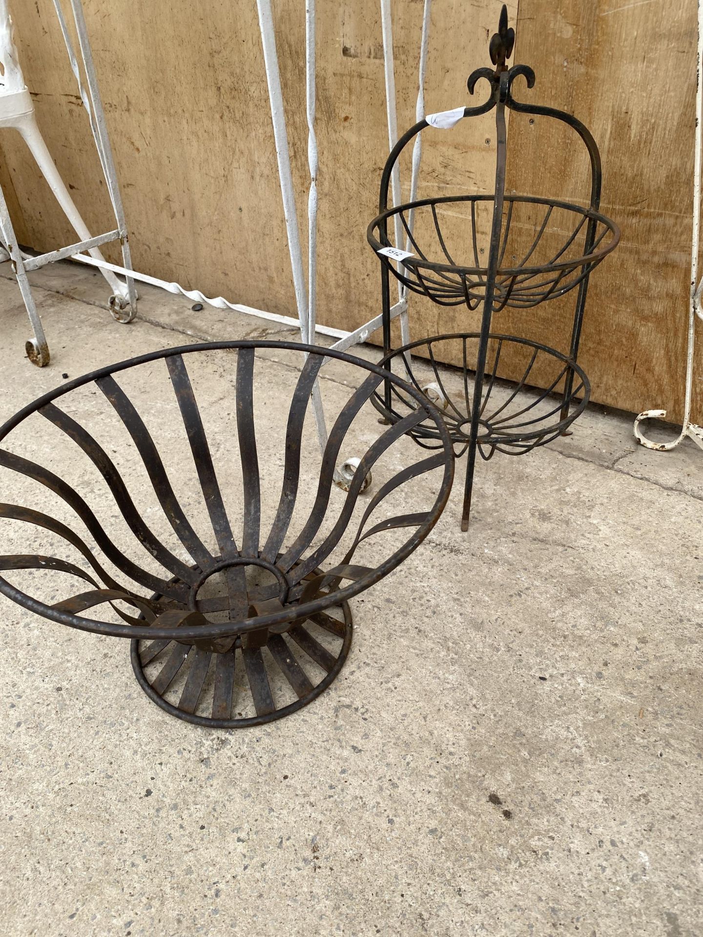 TWO DECORATIVE METAL PLANT STANDS
