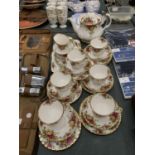 A ROYAL ALBERT 'OLD COUNTRY ROSES' TEASET TO INCLUDE A TEAPOT, CREAM JUG, SUGAR BOWL,SANDWICH AND