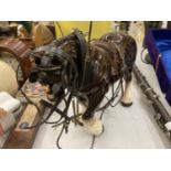 A VINTAGE CERAMIC SHIRE HORSE FIGURE WITH TACK ACCESSORIES