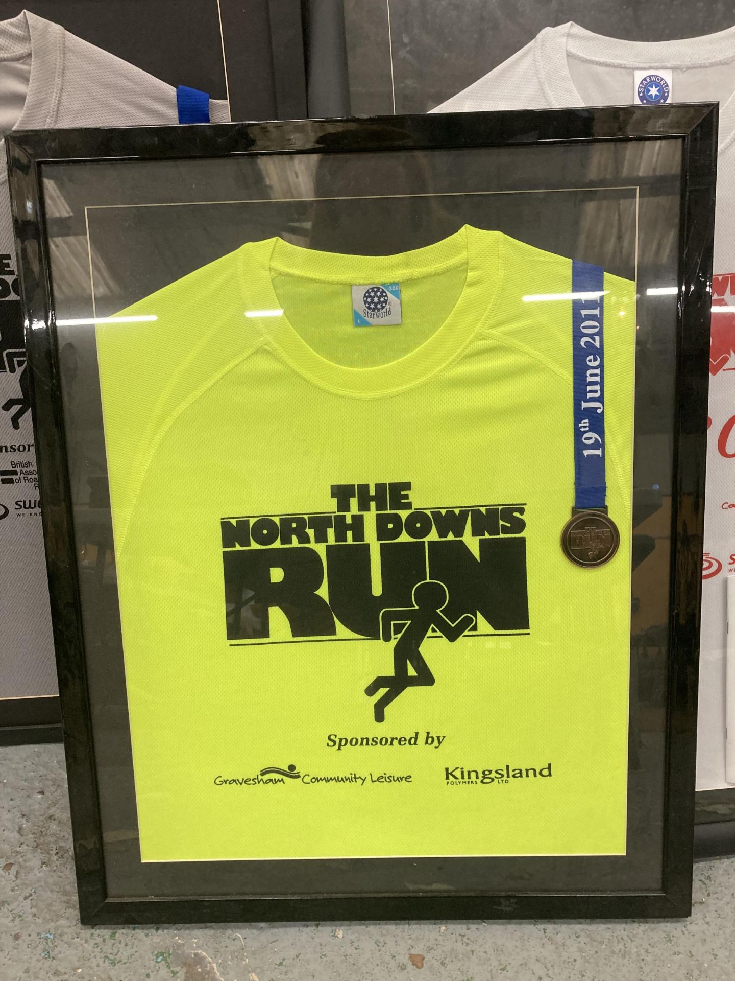 THREE FRAMED AND GLAZED WINNERS SHIRTS AND MEDALS FROM THE NORTH DOWNS RUNS - Image 2 of 4