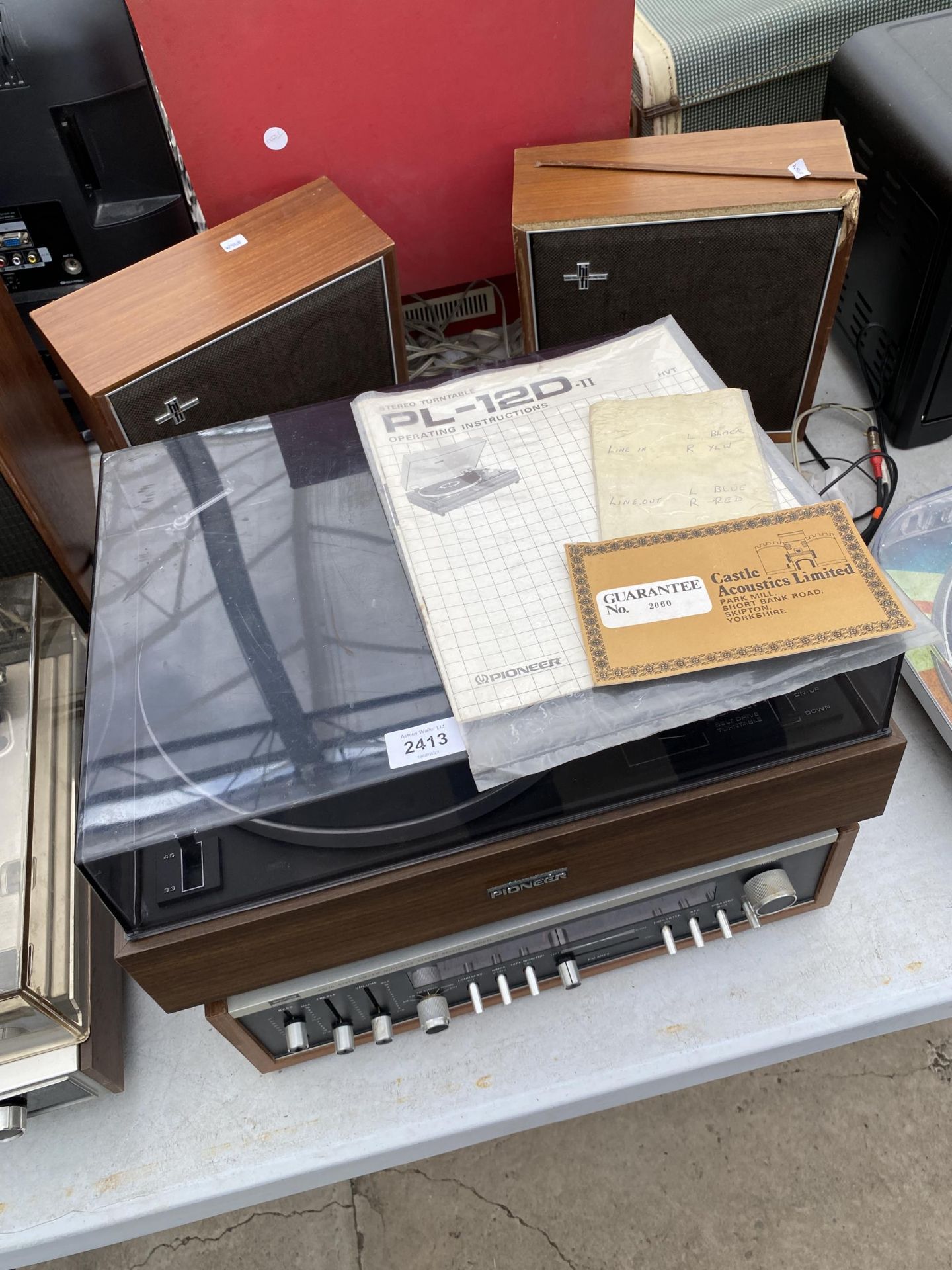 A PIONEER TURNTABLE, AN ALPHA MULTIPLEX STEREO RECIEVER AND A PAIR OF WOODEN CASED HI FIDELITY