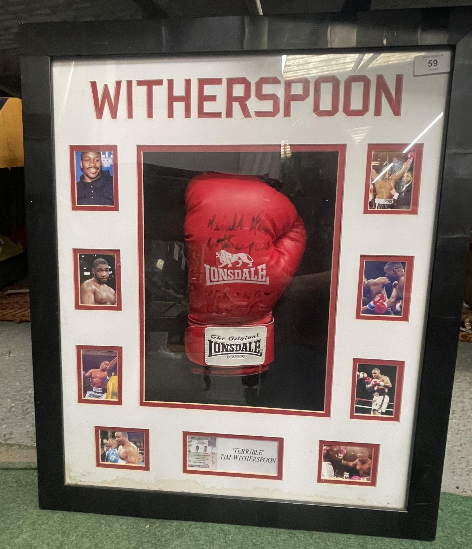 A TIM WITHERSPOON DOUBLE WORLD HEAVYWEIGHT CHAMPION, FRAMED AND SIGNED BOXING GLOVE MONTAGE WITH