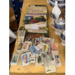 A COLLECTION OF VINTAGE CIGARETTE AND TEA CARDS, LOOSE AND IN ALBUMS