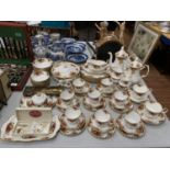 A LARGE QUANTITY OF ROYAL ALBERT OLD COUNTRY ROSES TO INCLUDE COFFEEPOTS, BUTTER DISH, UTENSILS,