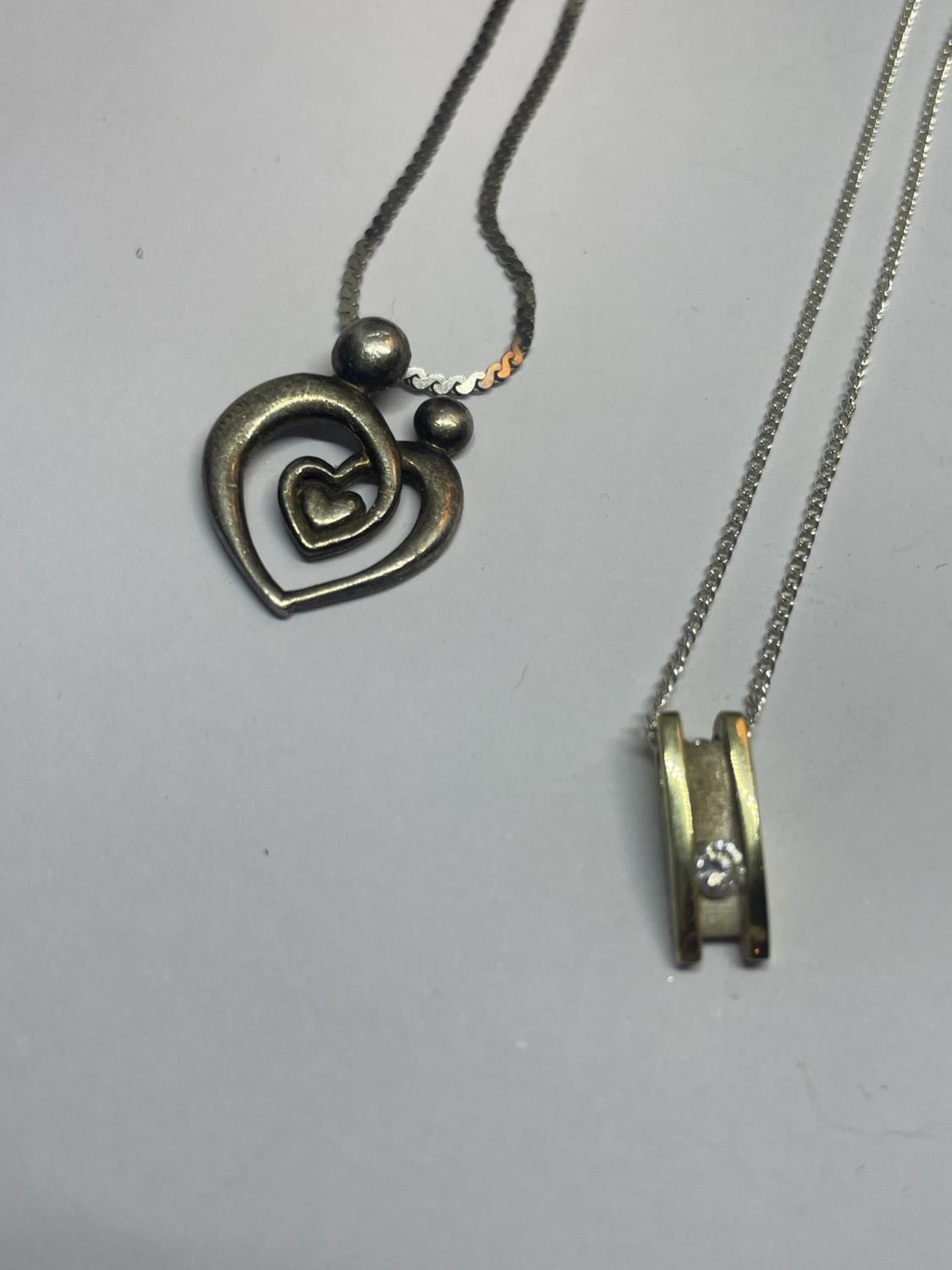 FOUR SILVER NECKLACES WITH PENDANTS - Image 2 of 3