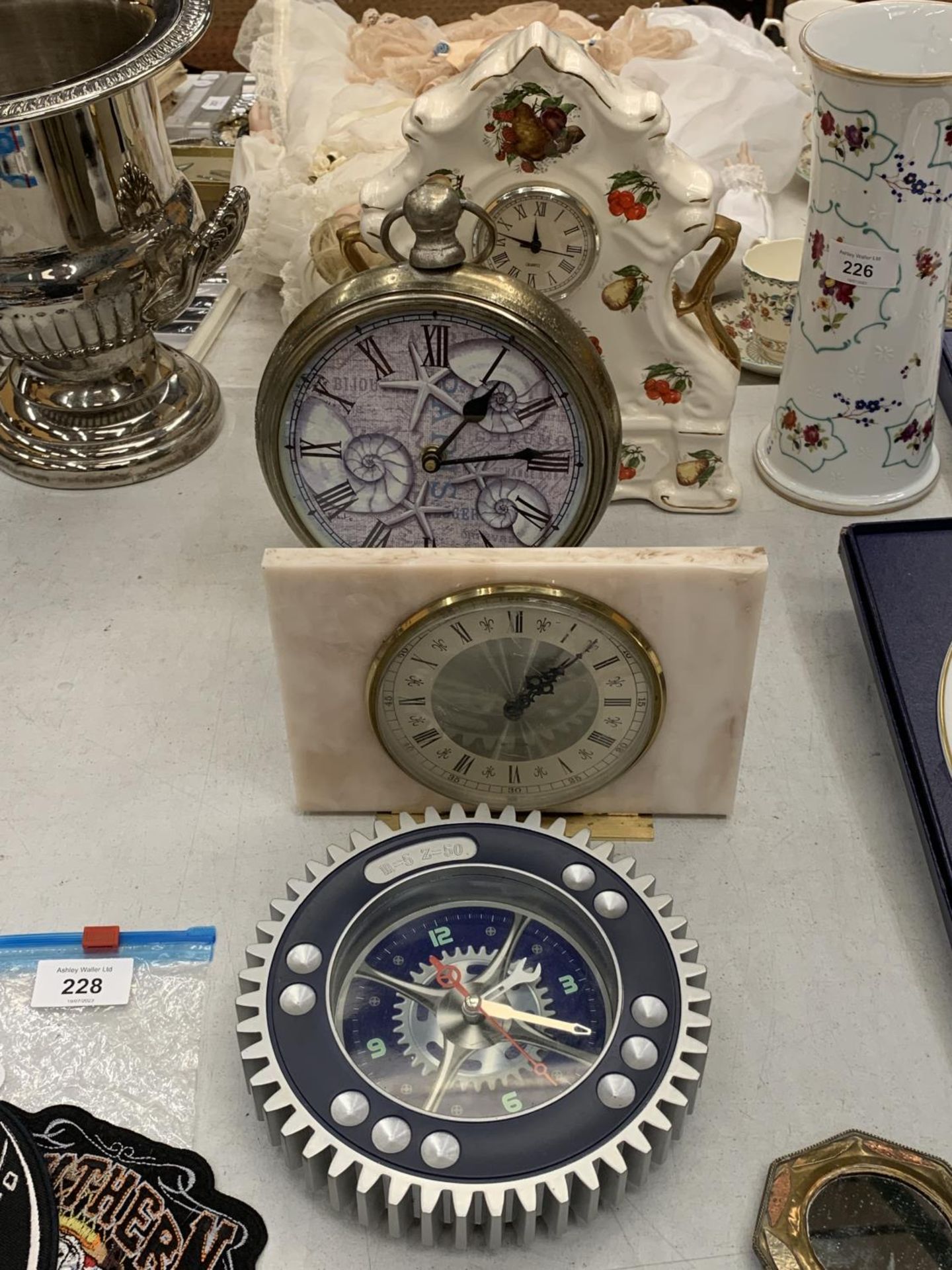 A BATTERY OPERATED CLOCK IN THE FORM OF A POCKET WATCH, WESTCLOX MANTLE CLOCK FAUX MARBLE ,