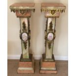 AN IMPRESSIVE PAIR OF ITALIAN ONYX AND MARBLE PEDESTAL COLUMNS WITH SWIVEL FIZEL SQUARE TOPS AND