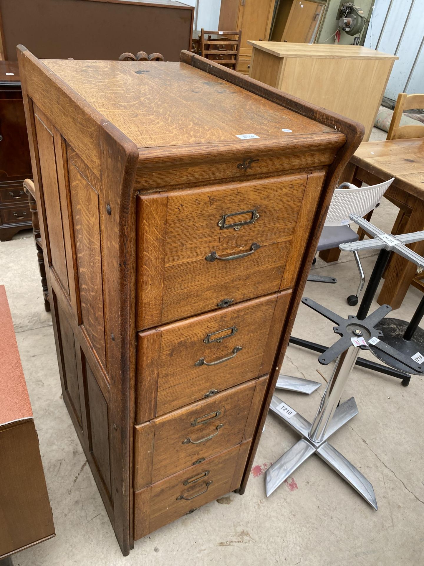 AN EARLY 20TH CENTURY OAK 4 DRAWER FILING CABINET