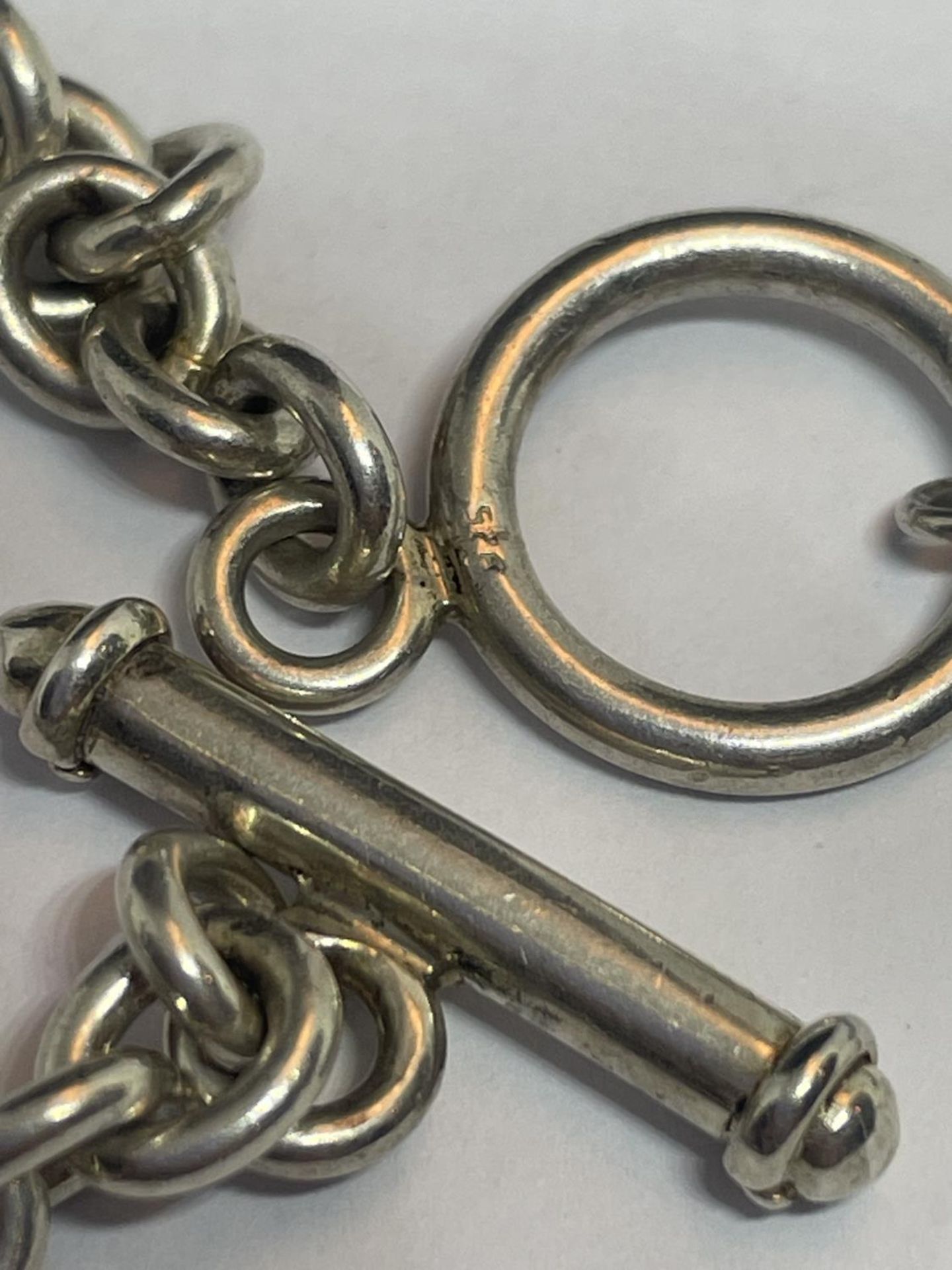 A SILVER HALF ALBERT CHAIN WITH A HALLMARKED BIRMINGHAM FOB - Image 3 of 3