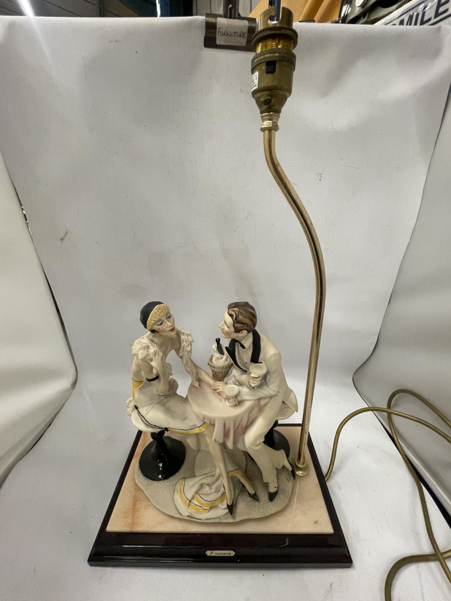 A 1987 FLORENCE CAPODIMONTE FIGURAL TABLE LAMP ON WOODEN BASE