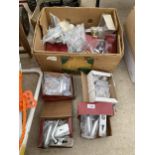 AN ASSORTMENT OF NEW AND PACKAGED DOOR HANDLES