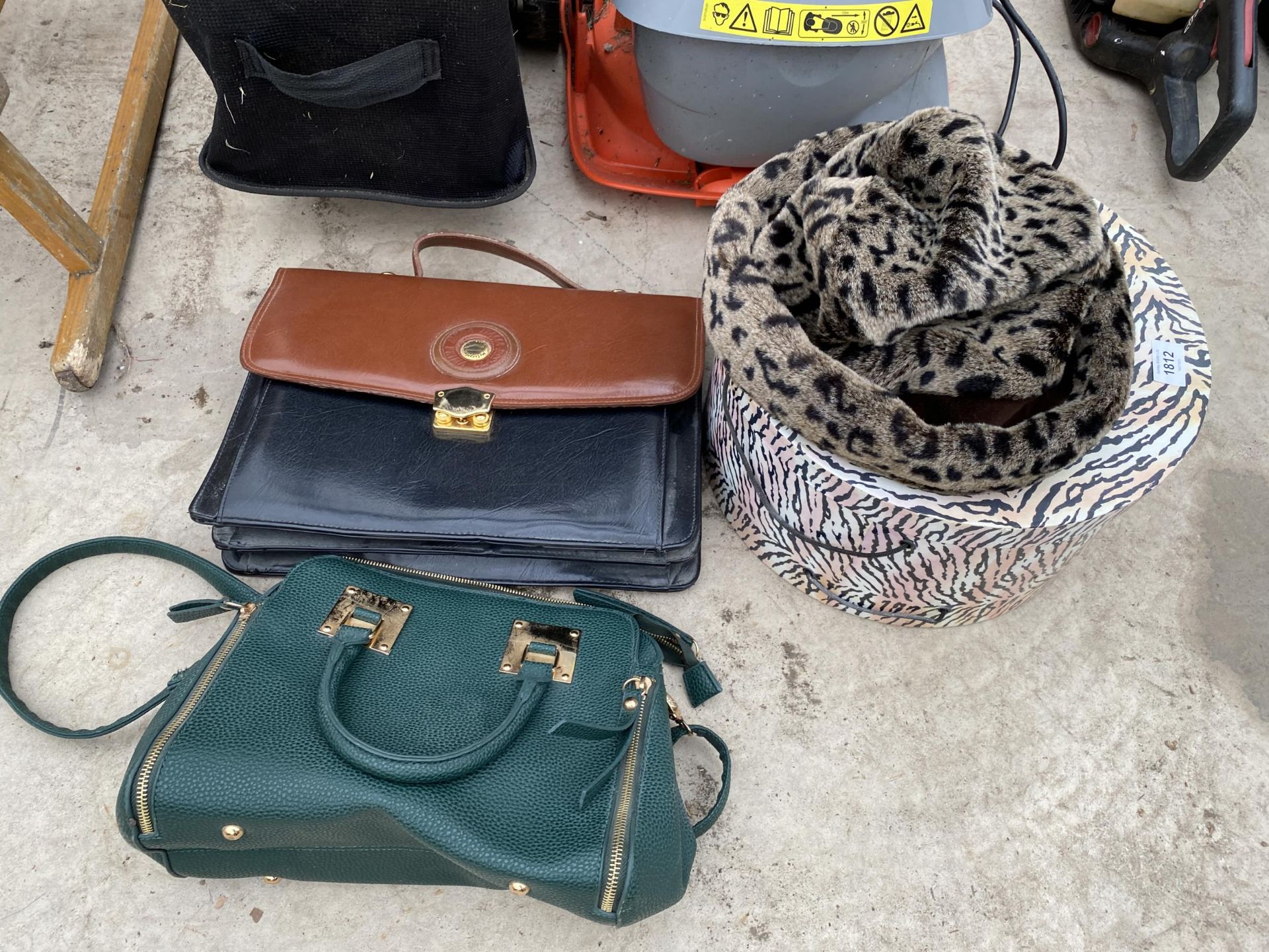 A LADIES HAT AND TWO HANDBAGS