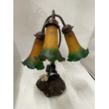 A VINTAGE TIFFANY STYLE LAMP WITH THREE FROSTED GLASS SHADES