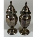 A PAIR OF BIRMINGHAM HALLMARKED SILVER SALT AND PEPPER SHAKERS, HEIGHT 10.5CM, TOTAL WEIGHT 84G