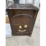 A VINTAGE HEAVY CAST IRON FIRE SAFE WITH BRASS FITTINGS (UNLOCKED BUT NO KEY PRESENT)