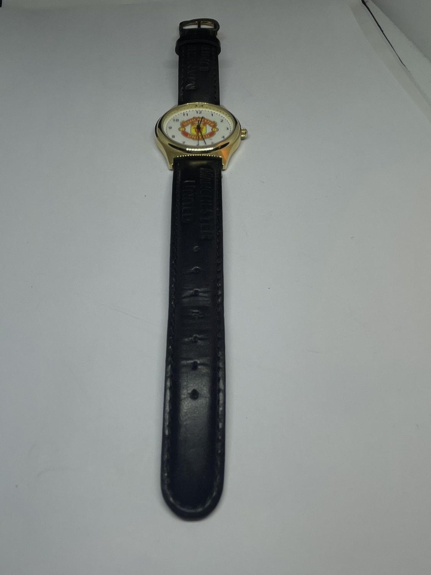 A MANCHESTER UNITED WRIST WATCH SEEN WORKING BUT NO WARRANTY