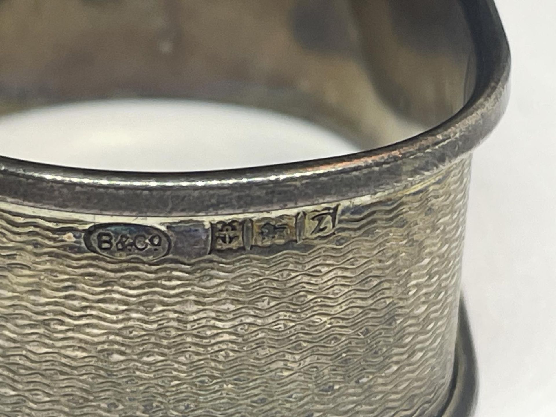 TWO SILVER NAPKIN RINGS ONE HALLMARKED LONDON AND ONE BIRMINGHAM - Image 4 of 4