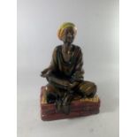 A ROYAL DOULTON FIGURINE MENDICANT HN 1365