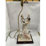 A 1987 FLORENCE CAPODIMONTE FIGURAL TABLE LAMP ON WOODEN BASE