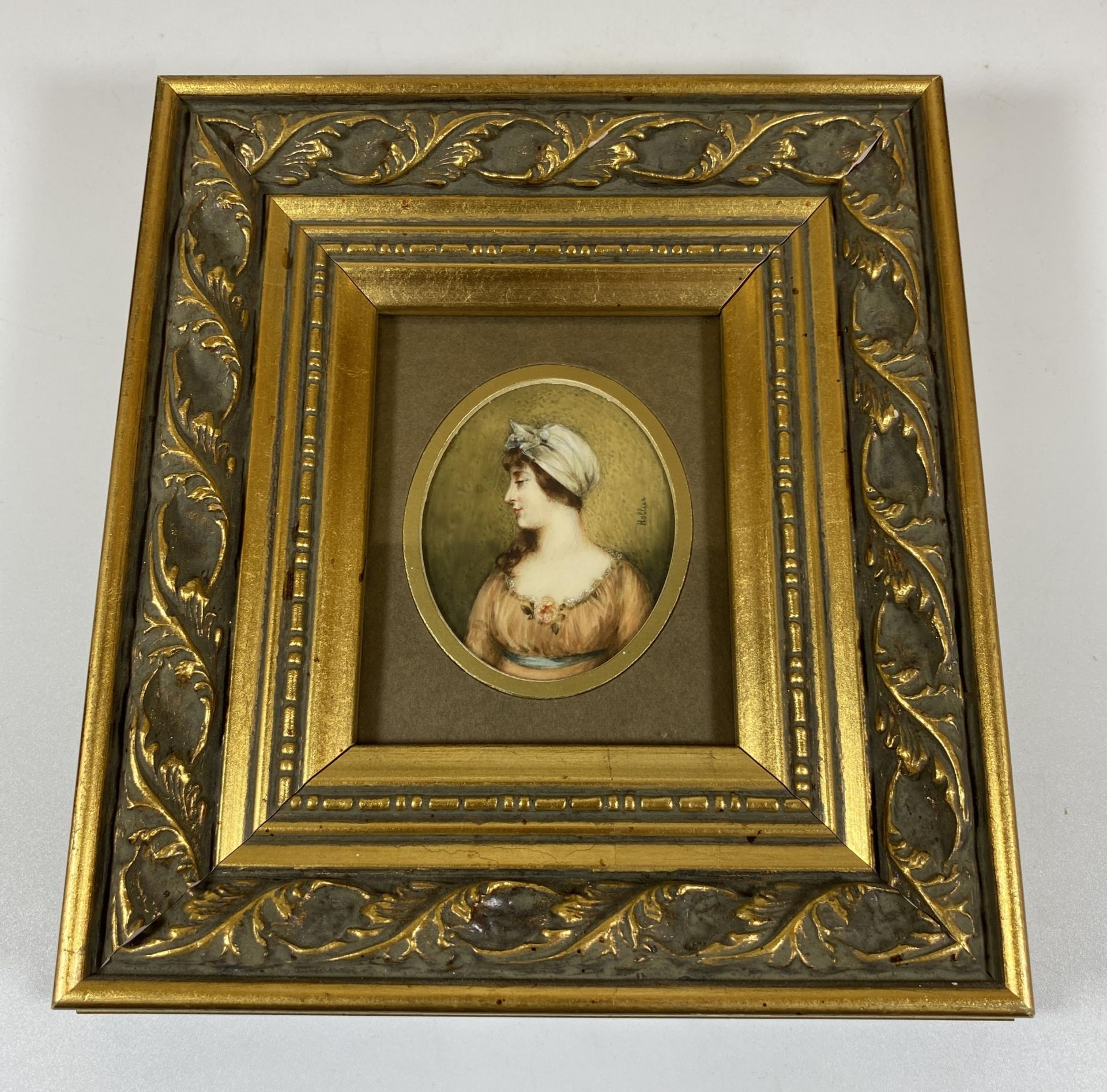 A HAND HIGHLIGHTED PORTRAIT OF A LADY, SIGNED, IN LATER GILT FRAME, 19 X 17CM