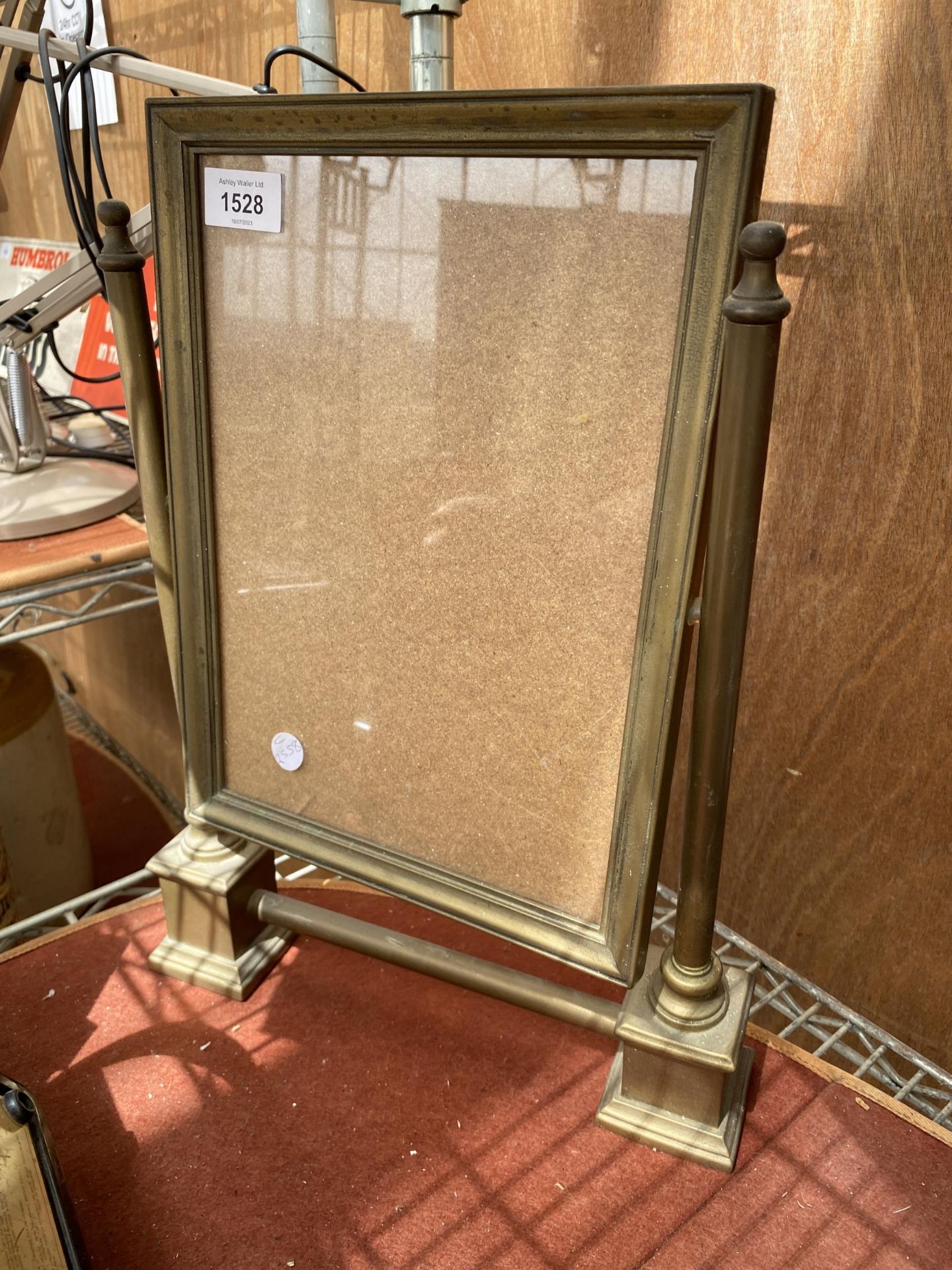 A VINTAGE BRASS SWING FRAME DRESSING TABLE MIRROR